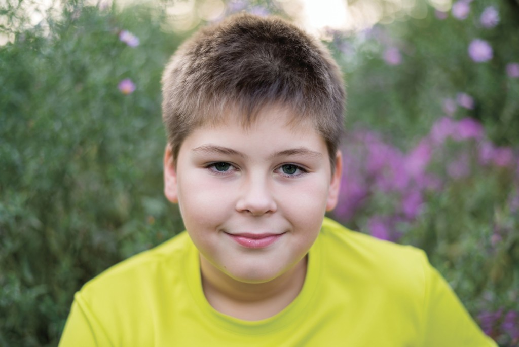 Portrait of a boy teen outdoors